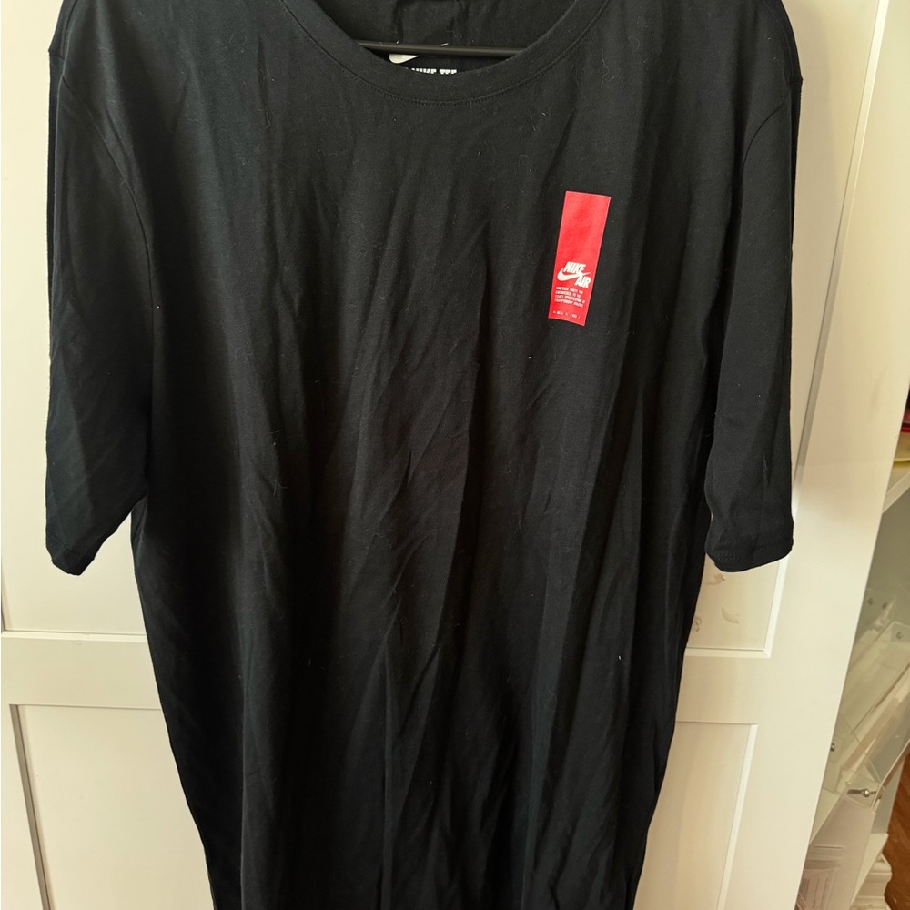 Nike Black Short-Sleeve Tee with Red Logo Patch